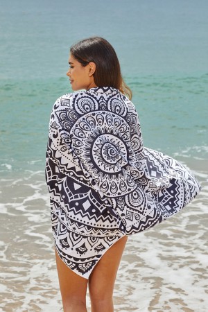 Serviette de plage noire à imprimé floral