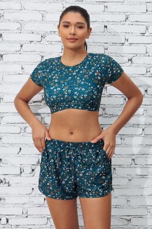 Ensemble haut de bikini à fleurs bleu avec manches et short taille haute pour garçon