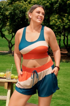 Top de bikini plus size sportif colorblock teal à col rond et fermeture éclair