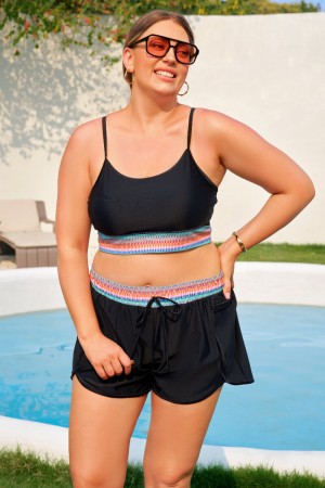Short athlétique plus size noir avec poches zippées